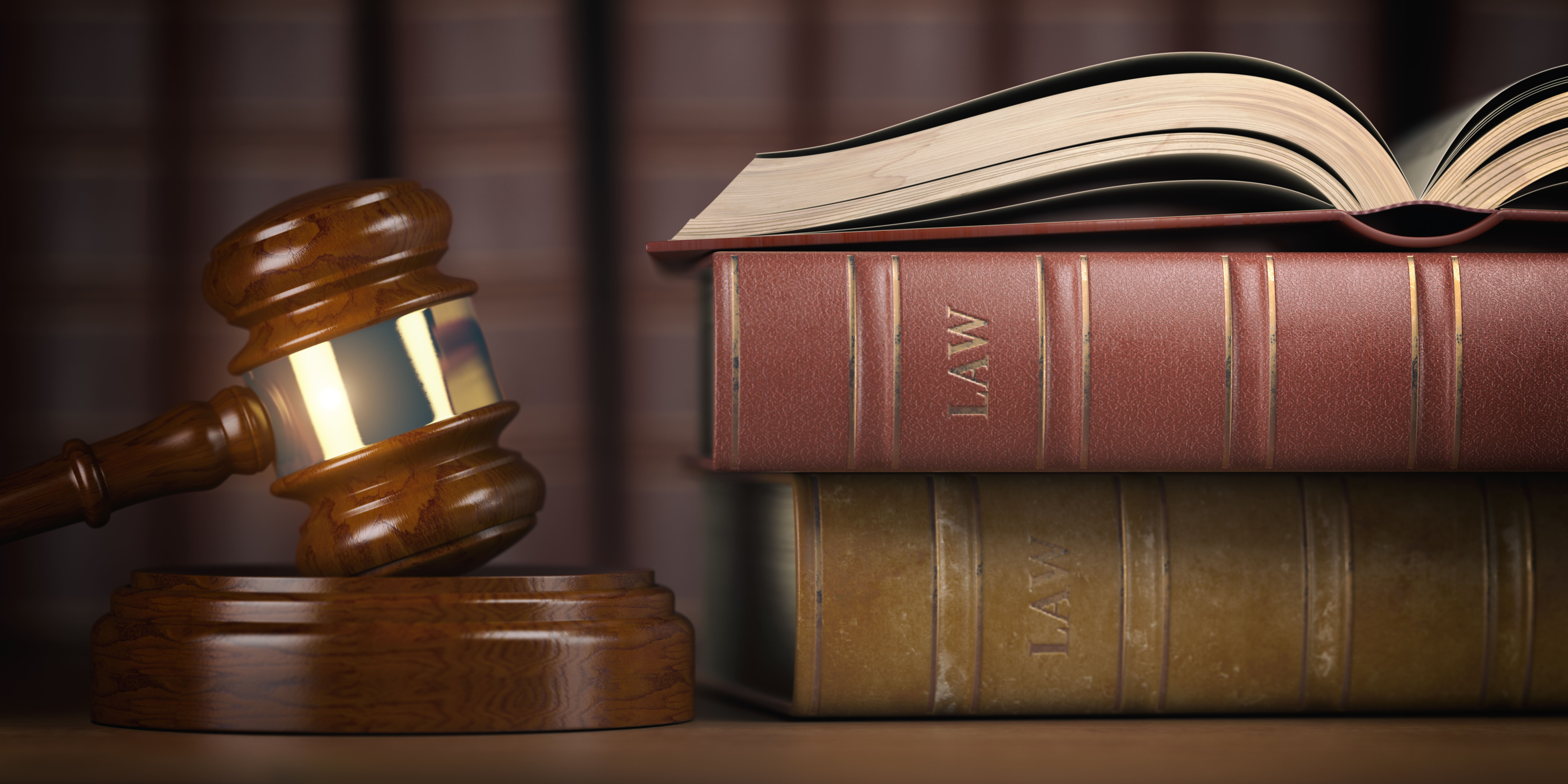 Law books and gavel on desk representing slip and fall questions Florida residents ask