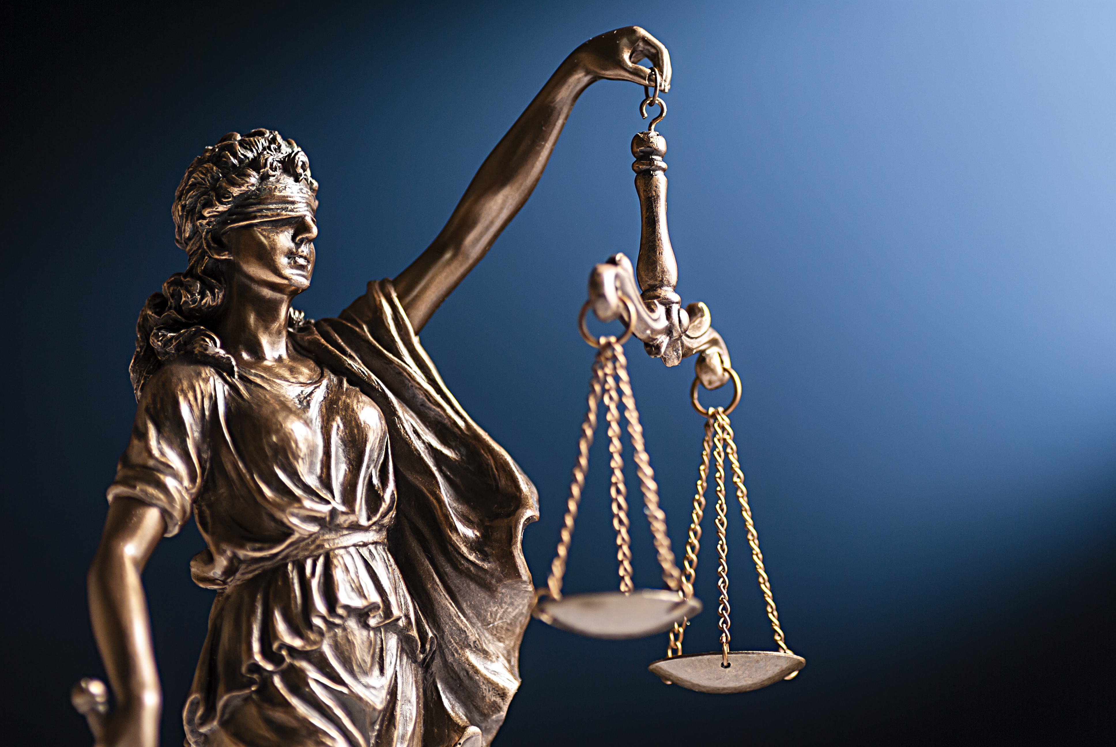 Scales of justice statue symbolizing legal rights in a slip and fall Tampa case